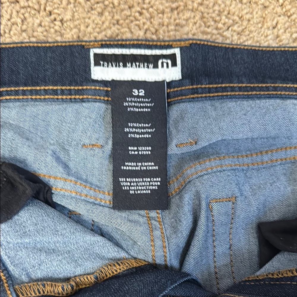 Travis Mathew Blue Jeans with Classic Denim Wash and Contrast Stitching